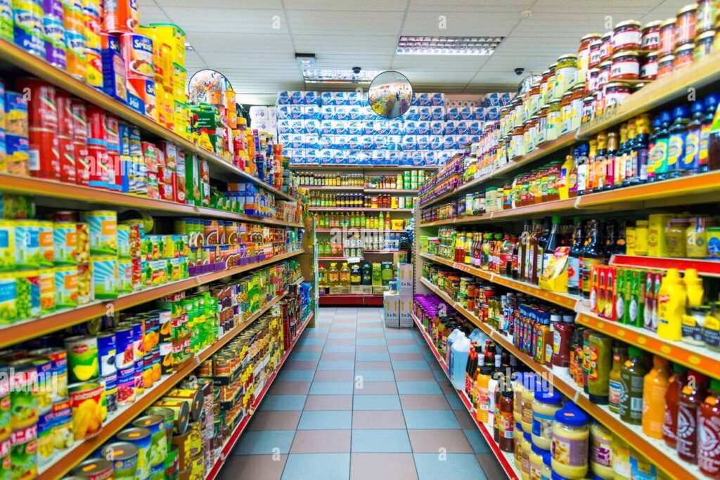 Large food wholesale warehouse with stacked pallets and shelves supplying bulk food products for restaurants and catering businesses in the UK