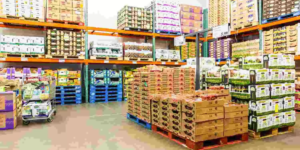 Wholesale food warehouse with bulk grocery boxes, pallets, and storage racks in Coventry UK