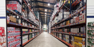 Large wholesale warehouse with fully stocked shelves and bulk inventory supplying restaurants, cafés, takeaways, and food businesses across the West Midlands.