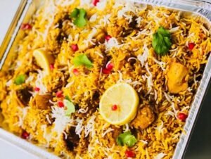 Buffet tray of chicken biryani prepared with premium 1121 Golden Sella Basmati Rice for catering, restaurants, and events