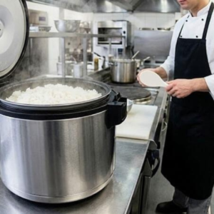 Professional chef cooking premium basmati rice in a commercial kitchen for catering, restaurants, and large food service operations