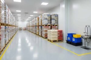 Modern Faaz Foods wholesale warehouse in Smethwick with bulk food products stored on pallets for restaurants, cafés, and catering businesses.