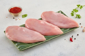 Fresh chicken breast fillets prepared for cooking
