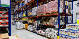 Large wholesale food warehouse with bulk rice, cooking oil, packaged groceries and catering supplies for restaurants.